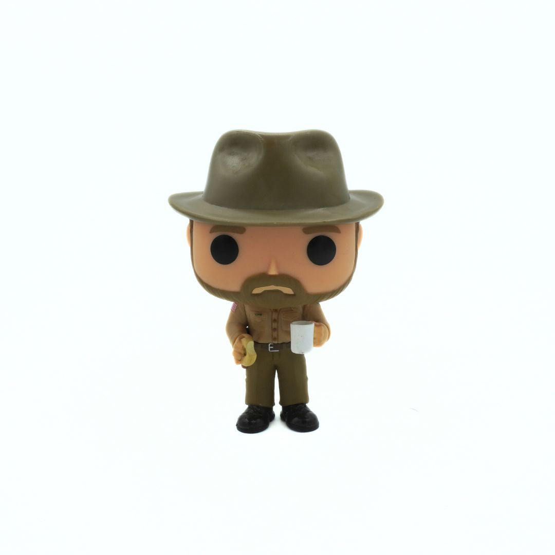 Funko Pop! vinyl figure of a character wearing a hat and holding a gun on a white background