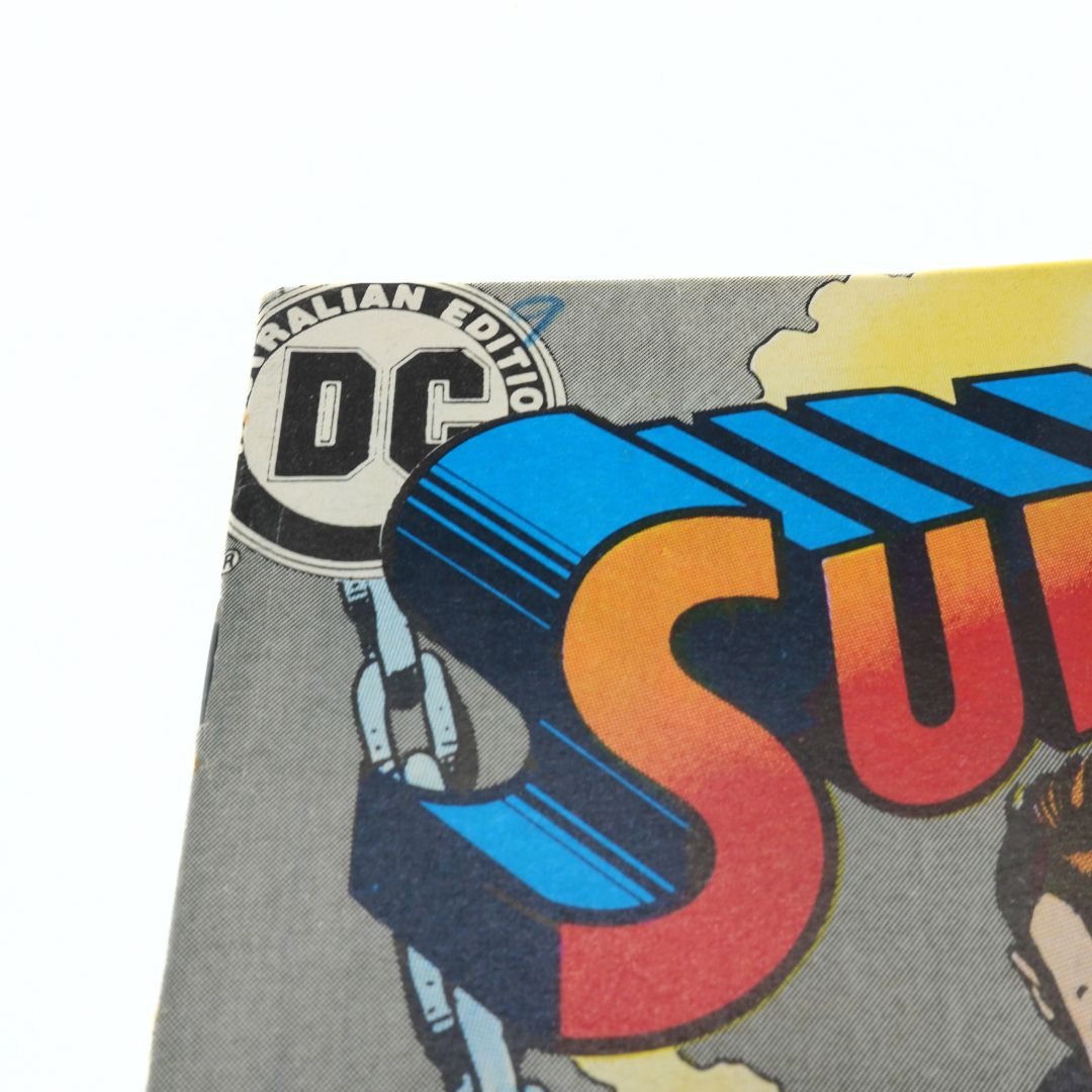 Comic book with 'Superman' logo and DC Comics branding on a gray background