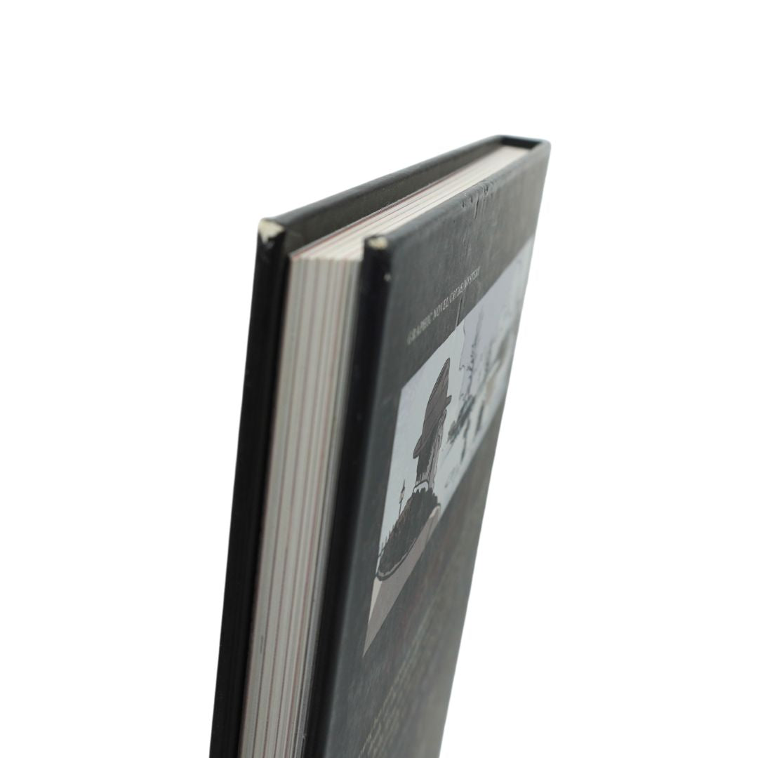 A hardcover book standing upright at an angle, showing its dark gray cover with a black-and-white portrait illustration and the title 'The Creep' partially visible, against a plain white background.