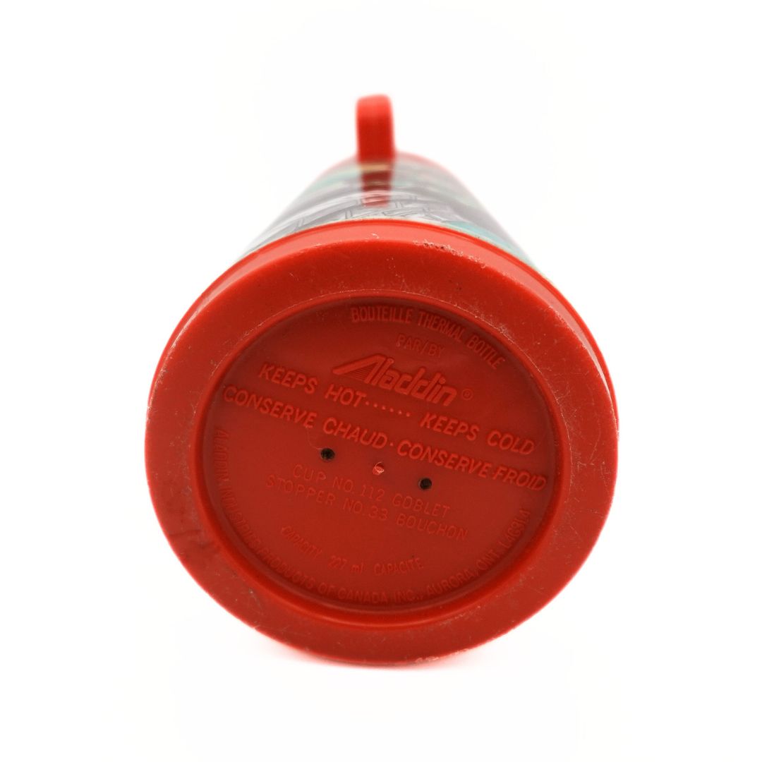 Red underside of the 60s era Aladdin Humphrey B Bear thermos showing the branding and capacity