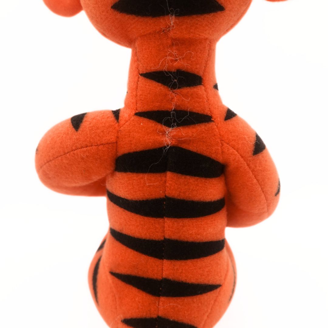 Closeup of the back of a 2001 Tigger plush showing some threads