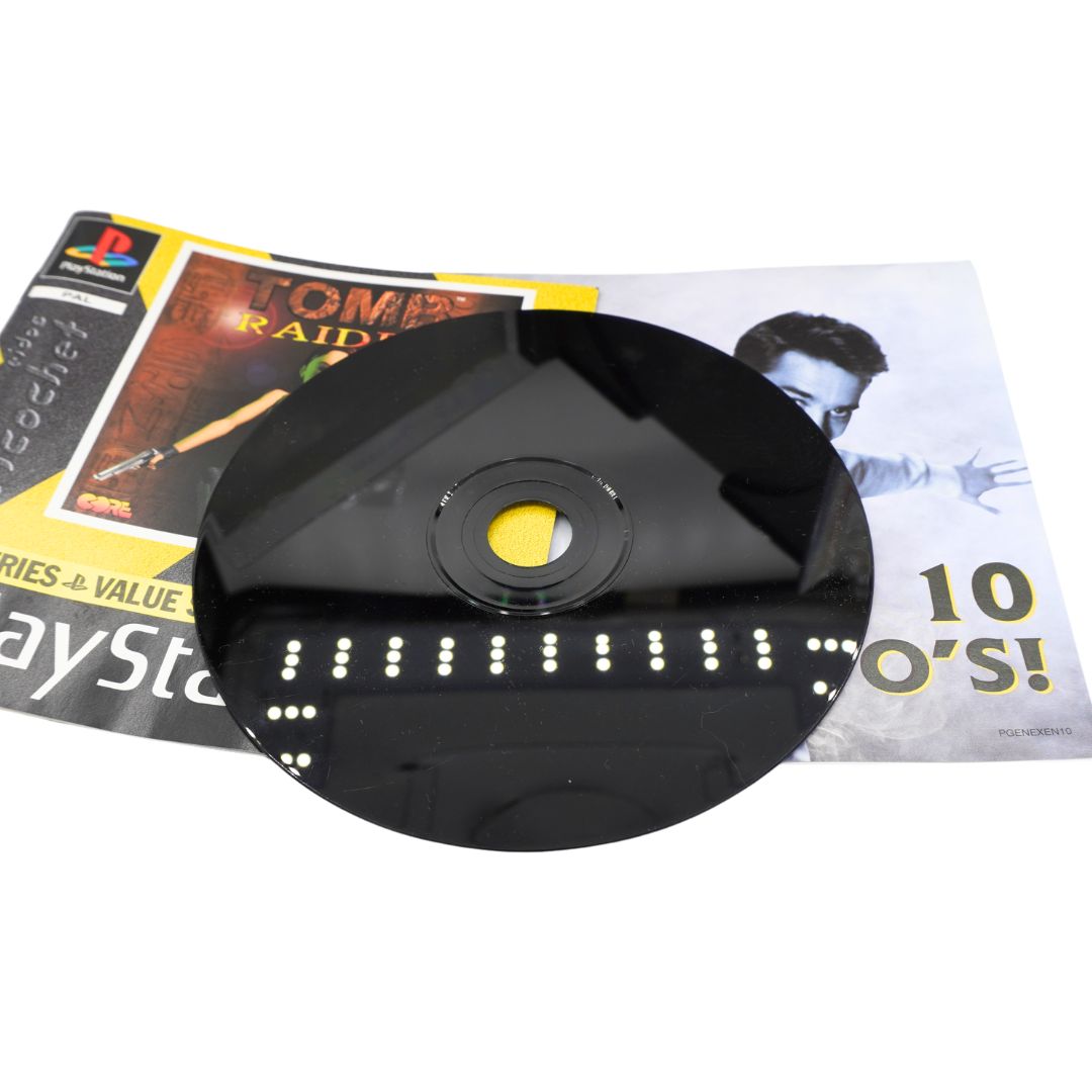Black disc for the Playstation 1 game Tomb Raider, with scratches