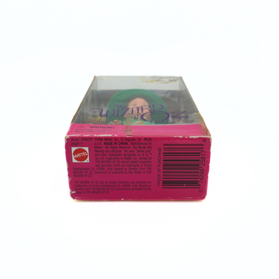 Underside of a vintage Tommy as Mayor Munchkin Wizard of Oz Barbie doll showing the copyright information and barcode