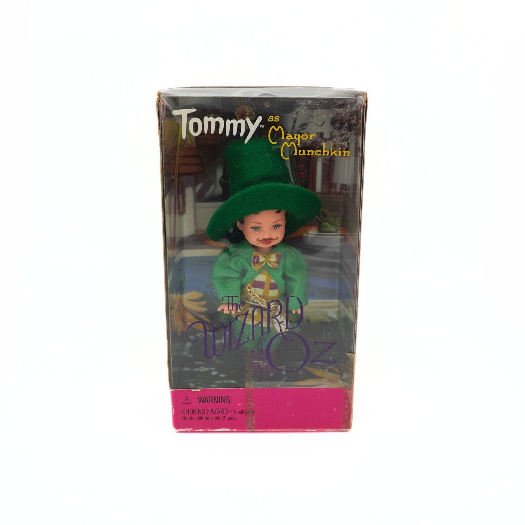1999 Barbie Mattel Tommy as Mayor Munchkin doll in a green outfit, still in its original packaging