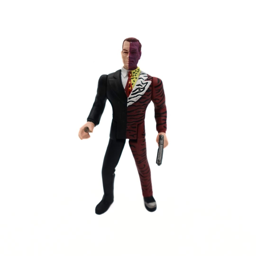 1995 Tommy Lee Jones Batman Forever Two-Face figurine with a half black suit and half zebra print suit