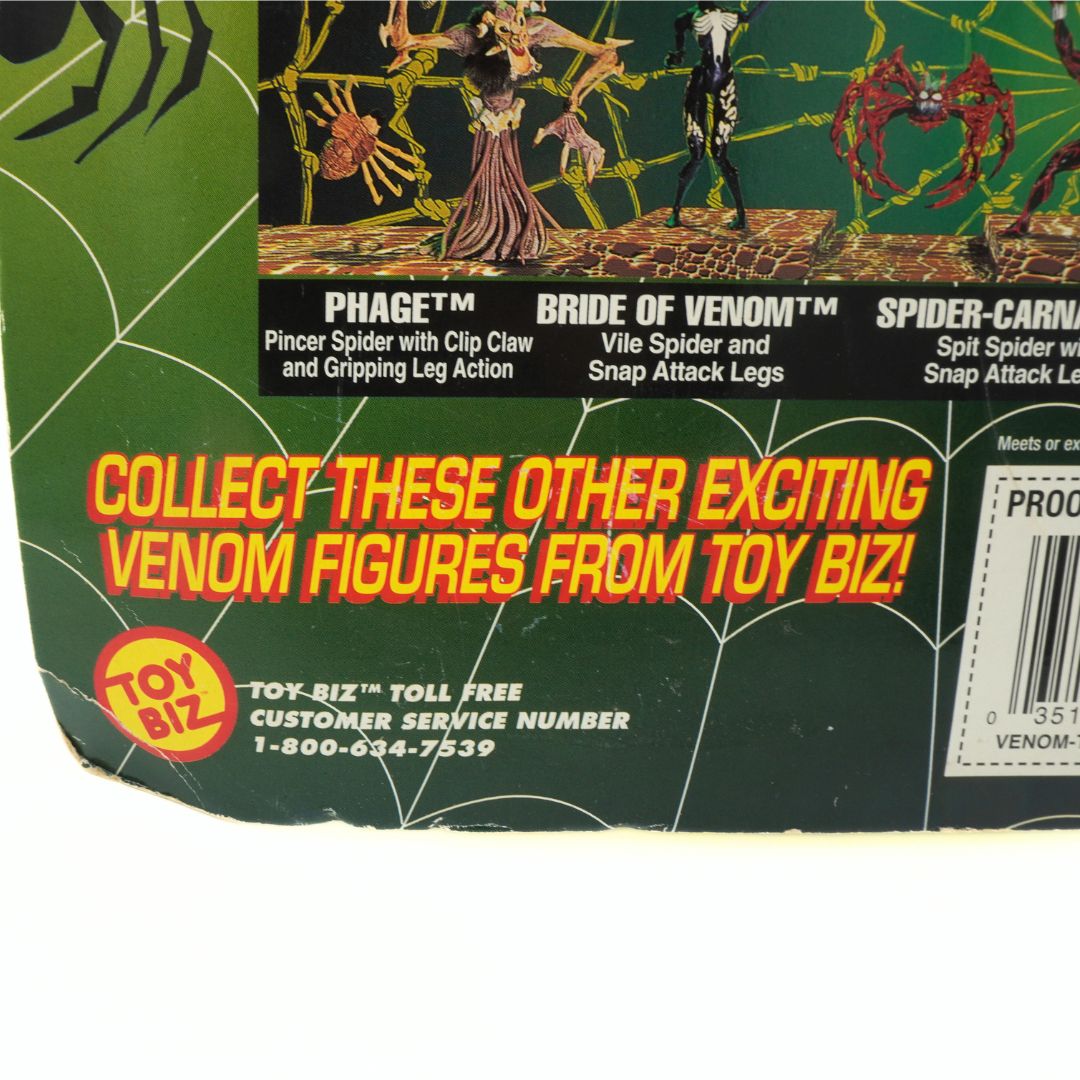 Creasing and wear to the corner of a 90s Venom-The Symbiote cardback