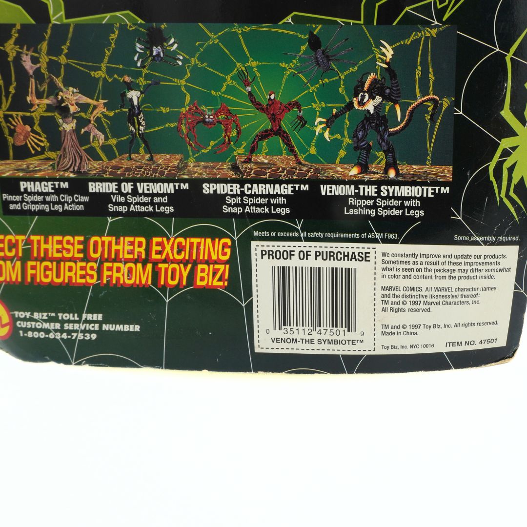 Barcode, Marvel and ToyBiz information seen at the base of the cardback on a 90s Venom-The Symbiote toy