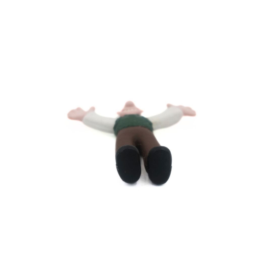 Underside of a vintage Wallace figure from the franchise Wallace & Gromit
