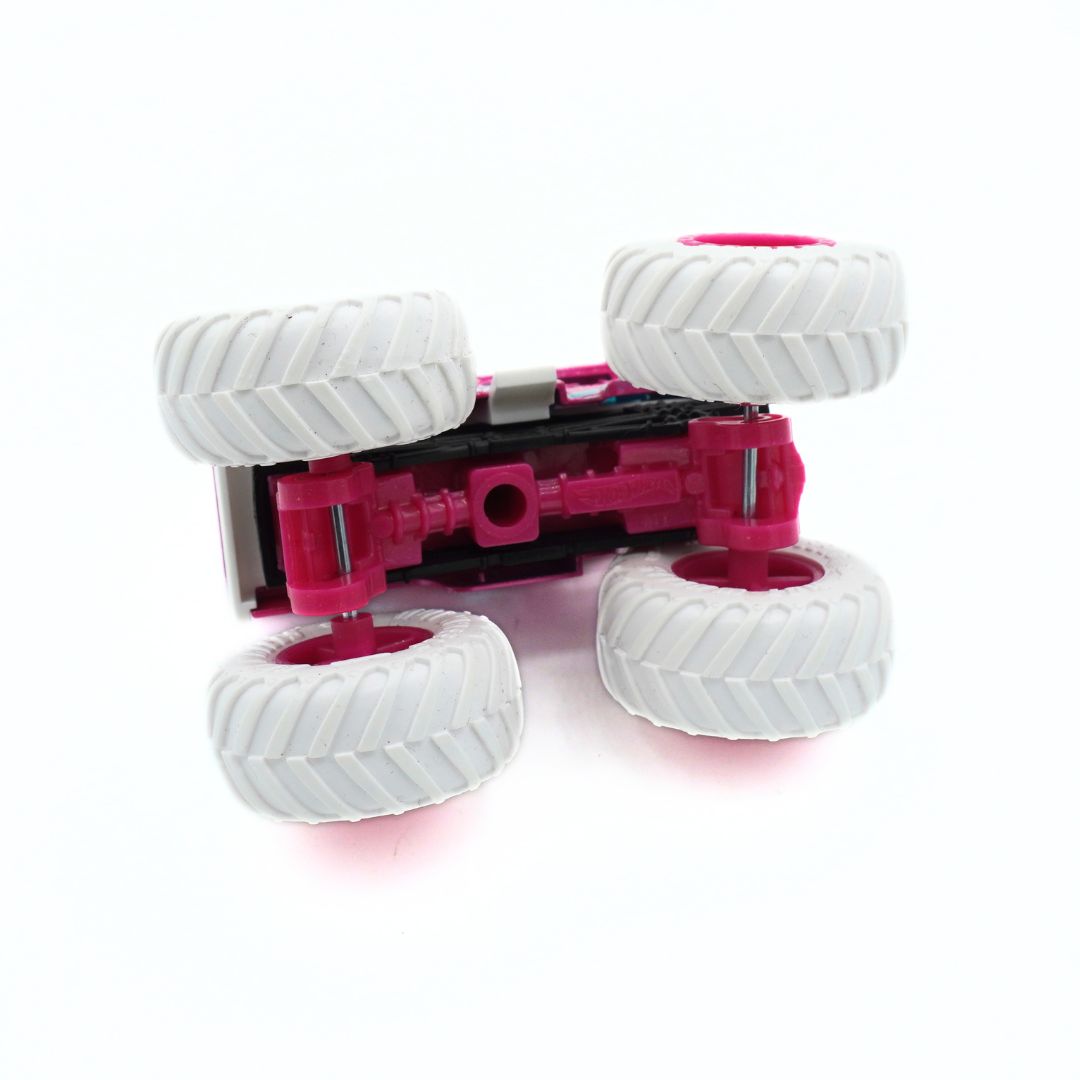 A small toy vehicle shown upside down on a white background, with four white treaded wheels and a bright pink and black chassis.