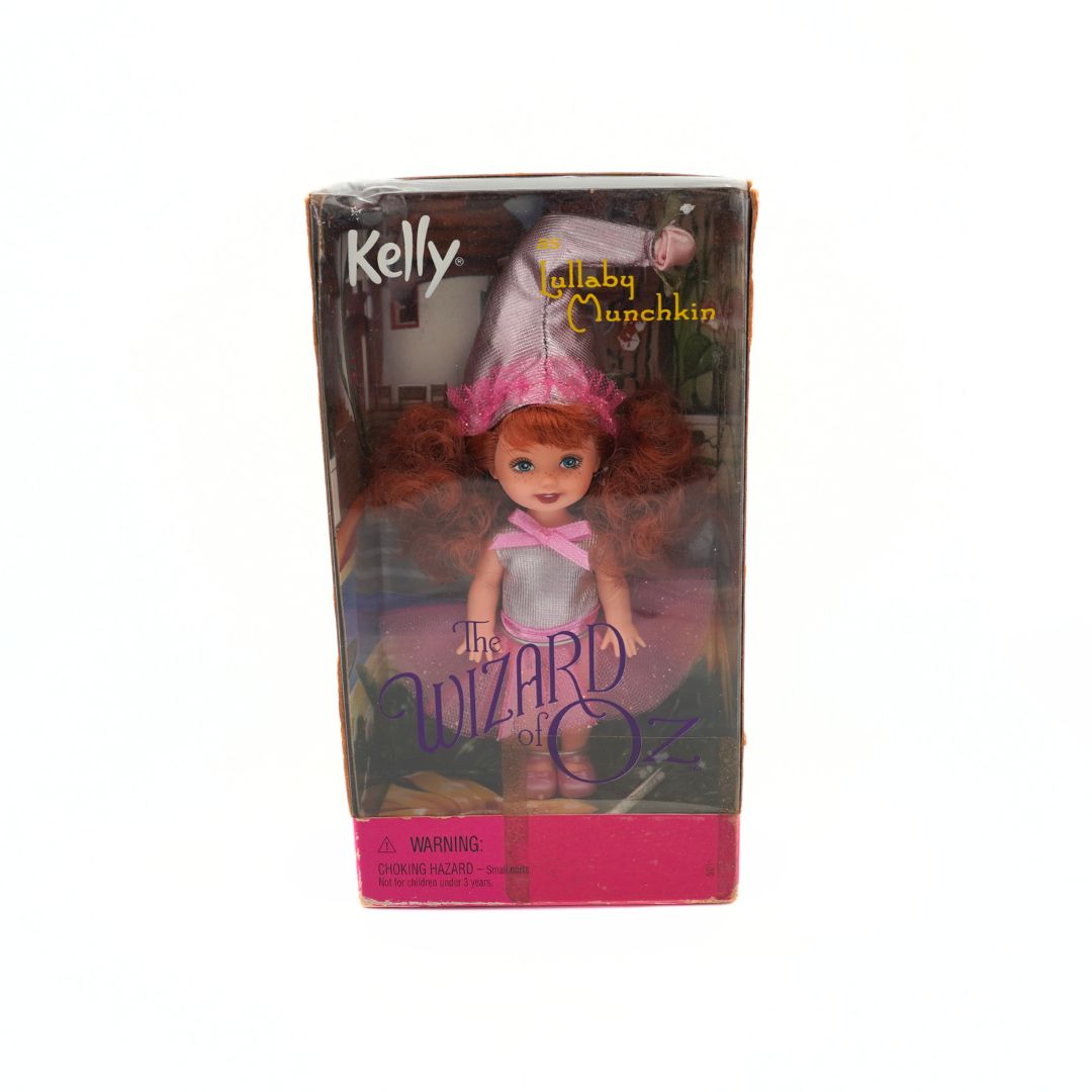 1999 Mattel Barbie Kelly as Lullaby Munchkin doll in a pink and purple box with a pink outfit