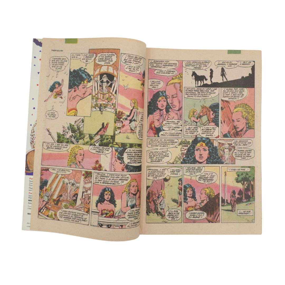 Comic book open to a page with multiple panels featuring a character in a fantasy setting.