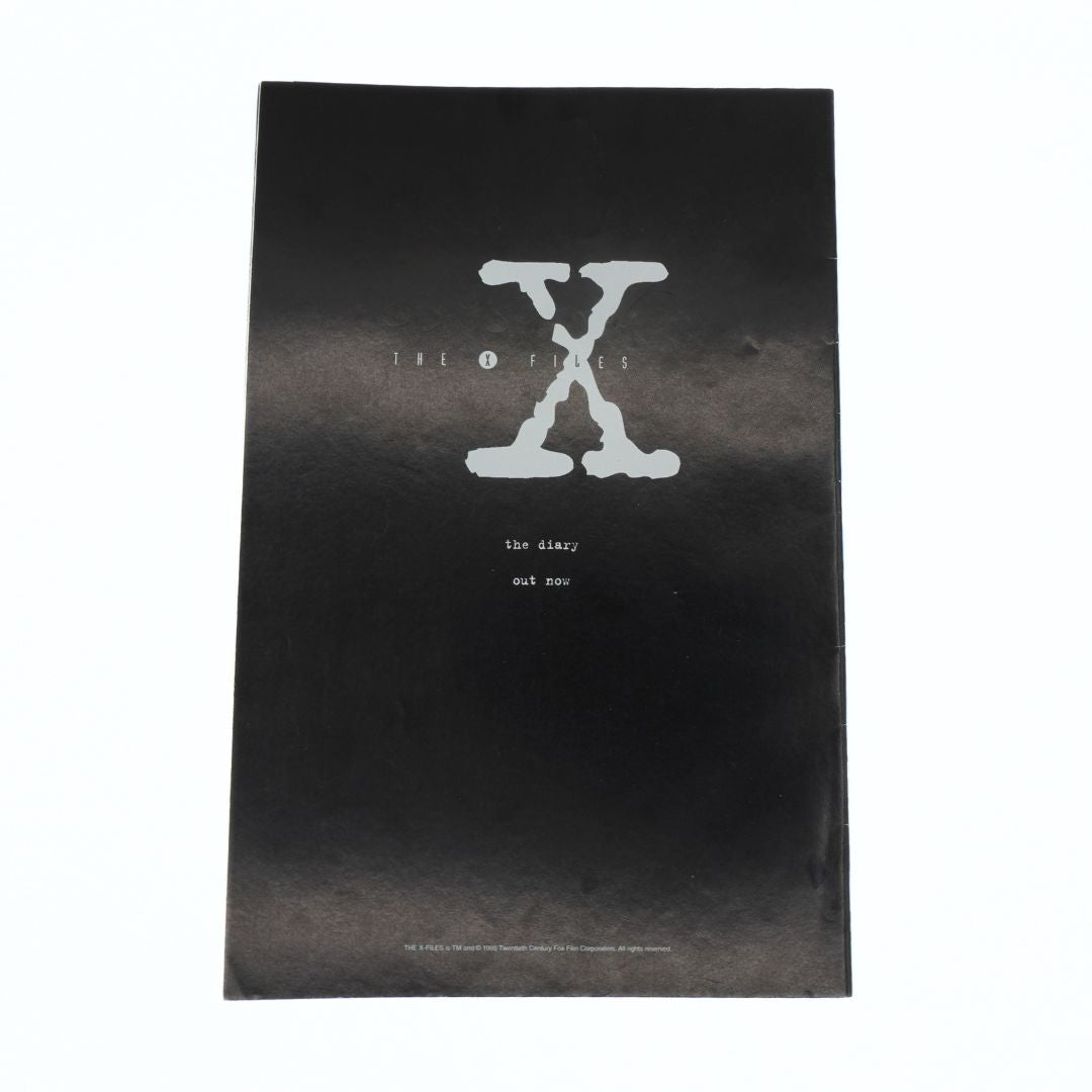 Black promotional poster with 'X' logo and text on a white background