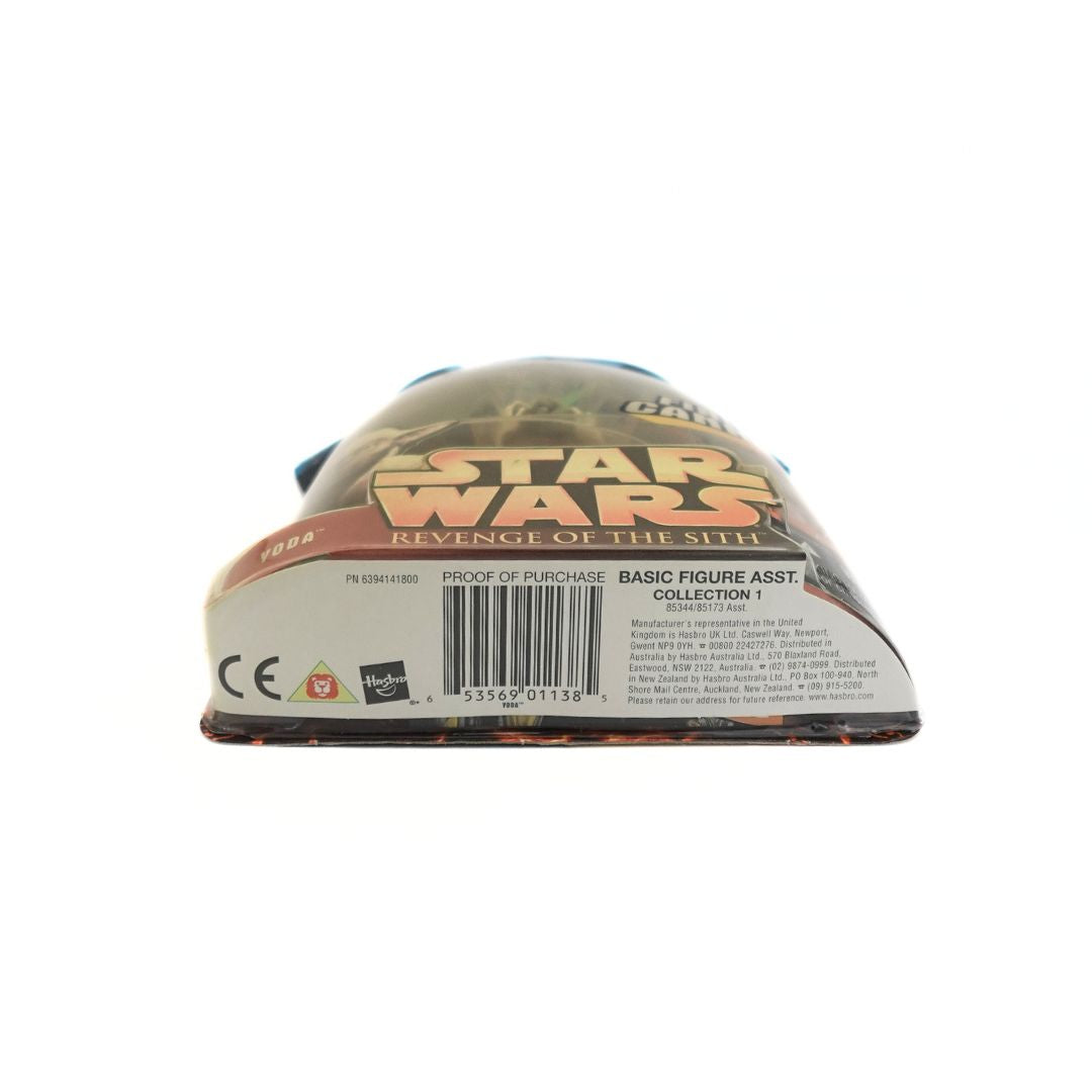 Underside of a Yoda Firing Cannon figurine with barcode and branding information