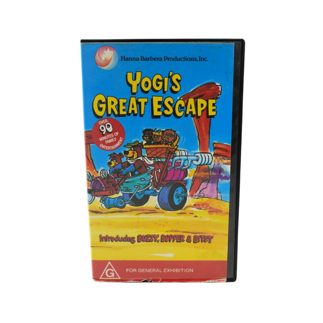 VHS tape of the made-for-TV film Yogi's Great Escape in its blue, yellow, red and black clamshell case