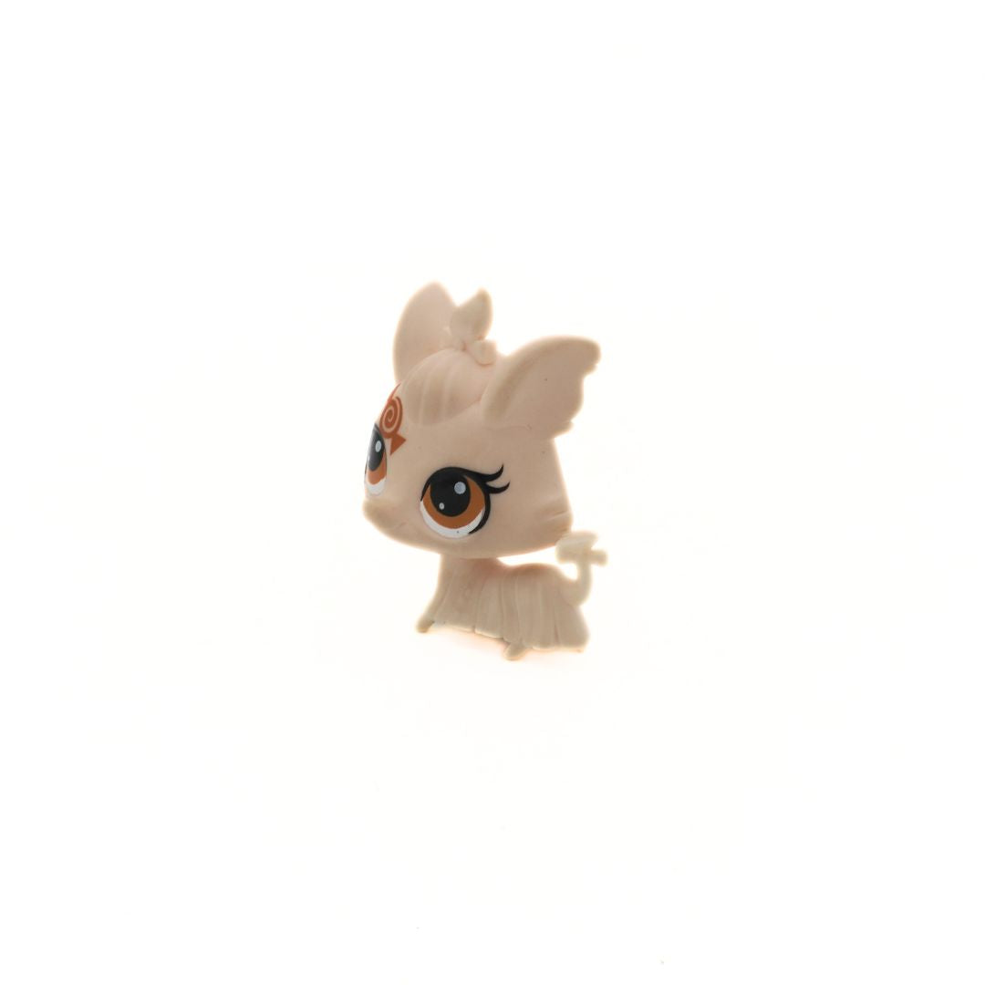 Small figure toy of a Yorkshire Terrier dog