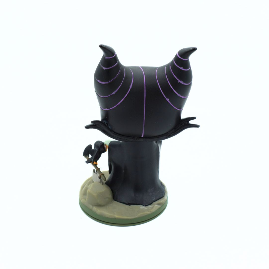 A collectible vinyl figure of Maleficent from Disney, shown from the back on a plain white background.