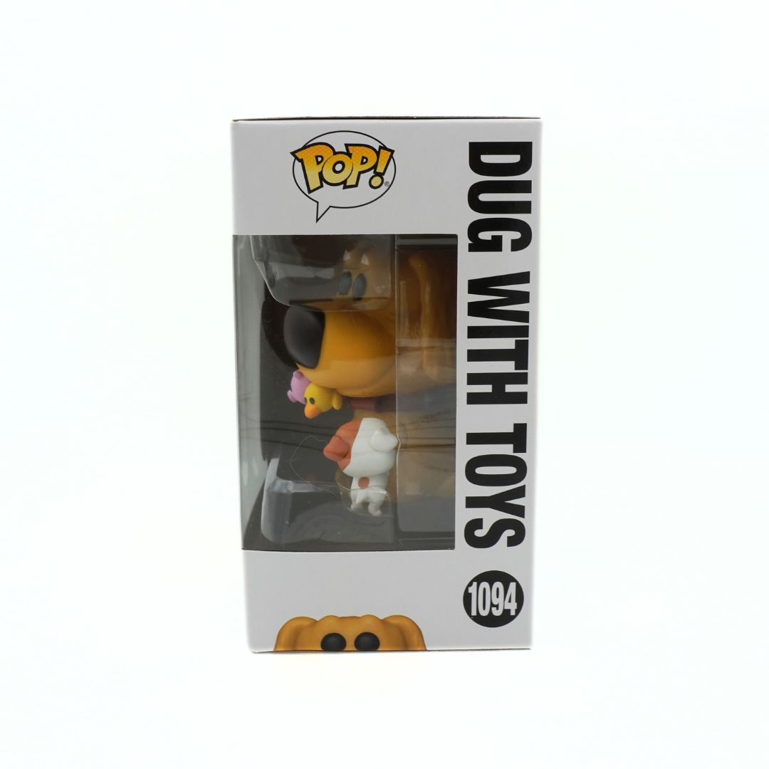 Pop! Vinyl figure packaging with 'Dug with Toys' branding on a white background