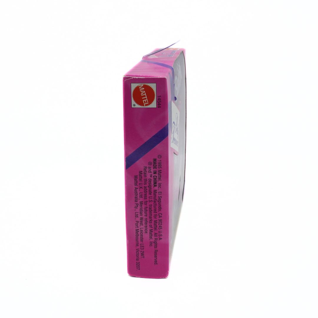 Pink Barbie product packaging on a white background