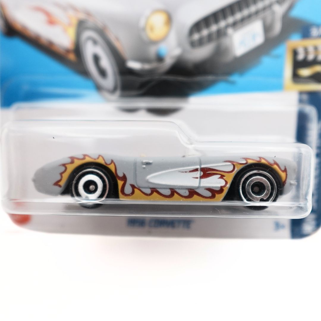 Close up of the 1956 Corvette from the Barbie movie showing the silver toy car with painted flames