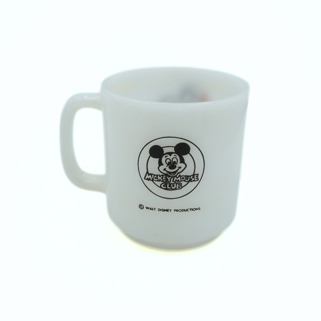 Glass vintage Mickey Mouse Club mug with a black, white and red colour palette