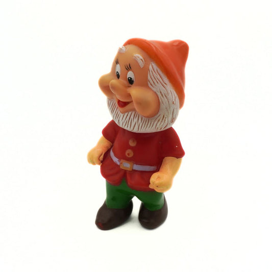 Dwarf figurine with a red hat and outfit on a white background
