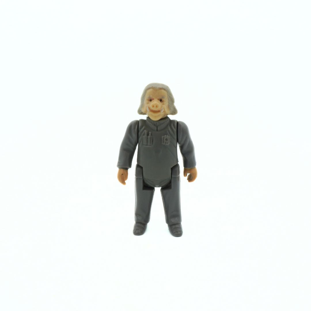 Toy figure in a gray outfit on a white background