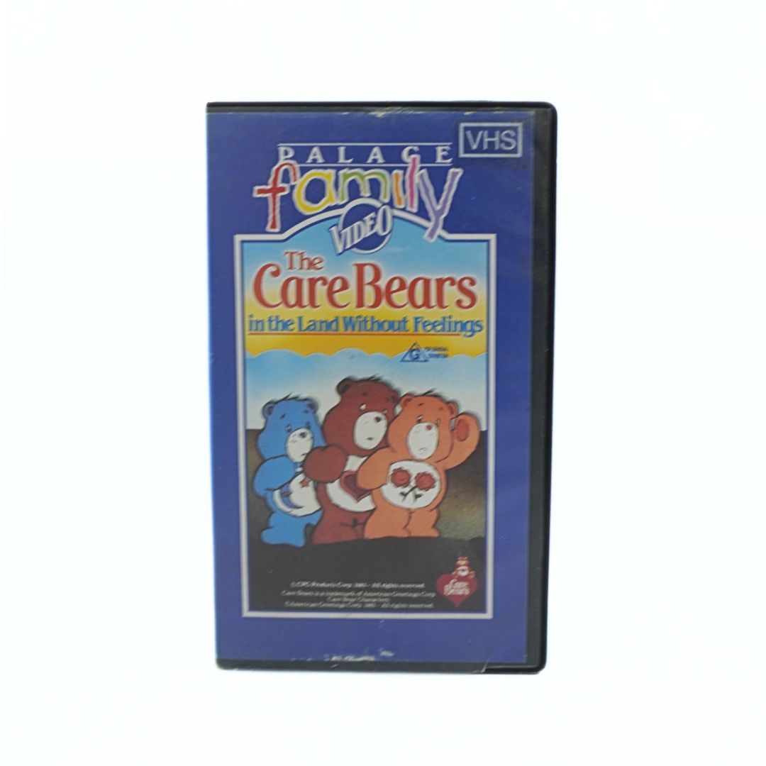 VHS tape of 'Care Bears in the Land Without Feelings' with Palace Family Video branding on a white background.