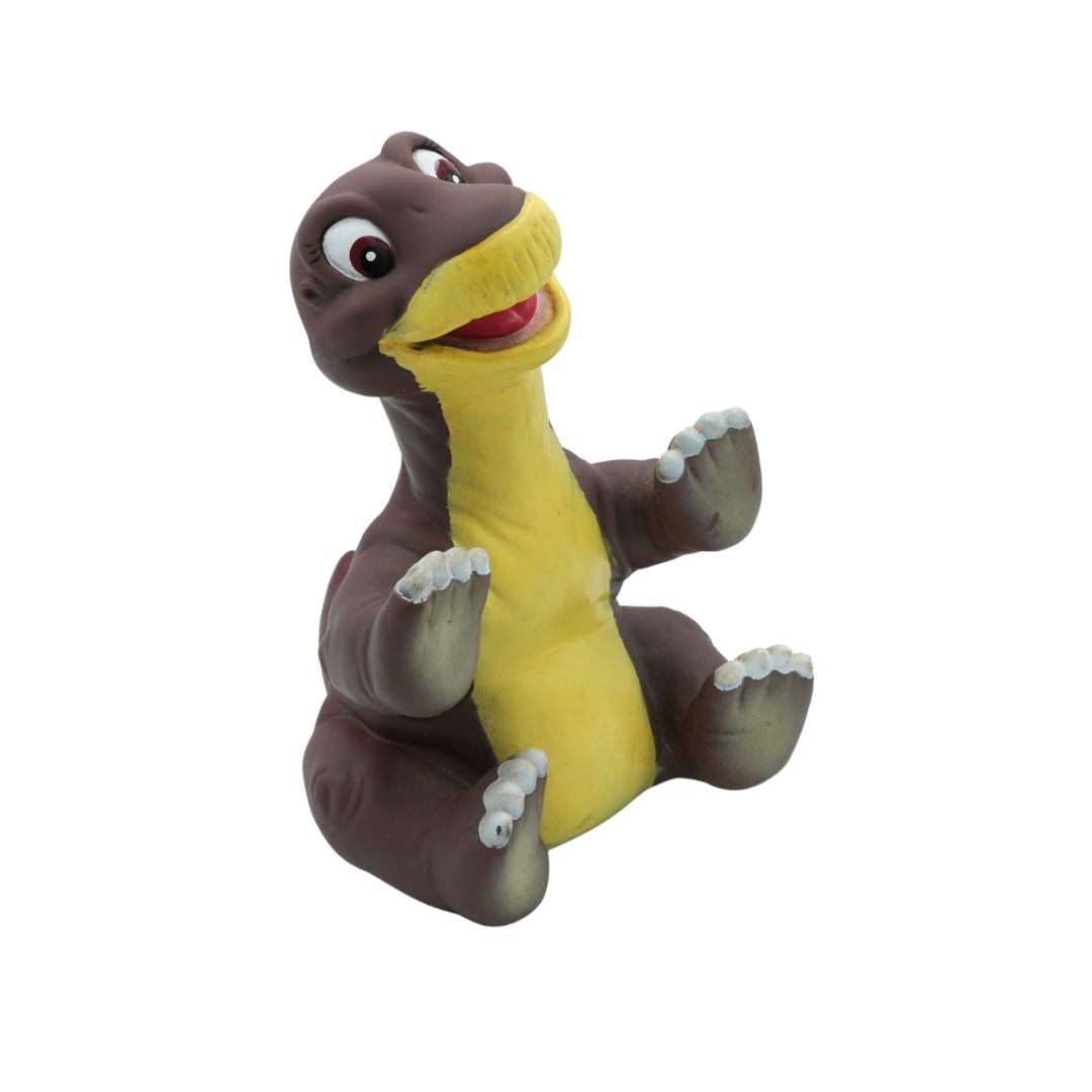 Plush toy dinosaur with brown top and yellow belly on a white background