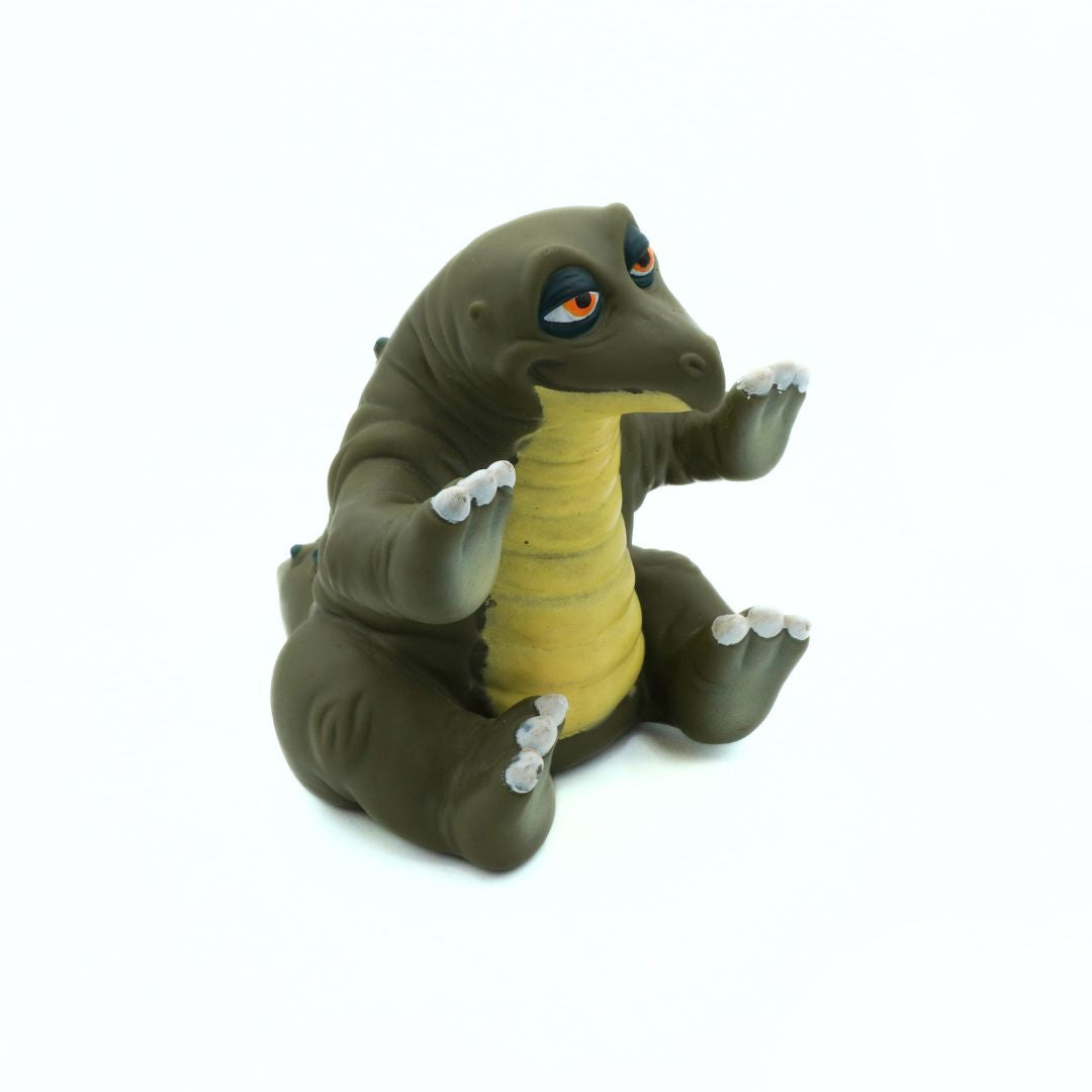 Toy dinosaur on a white background