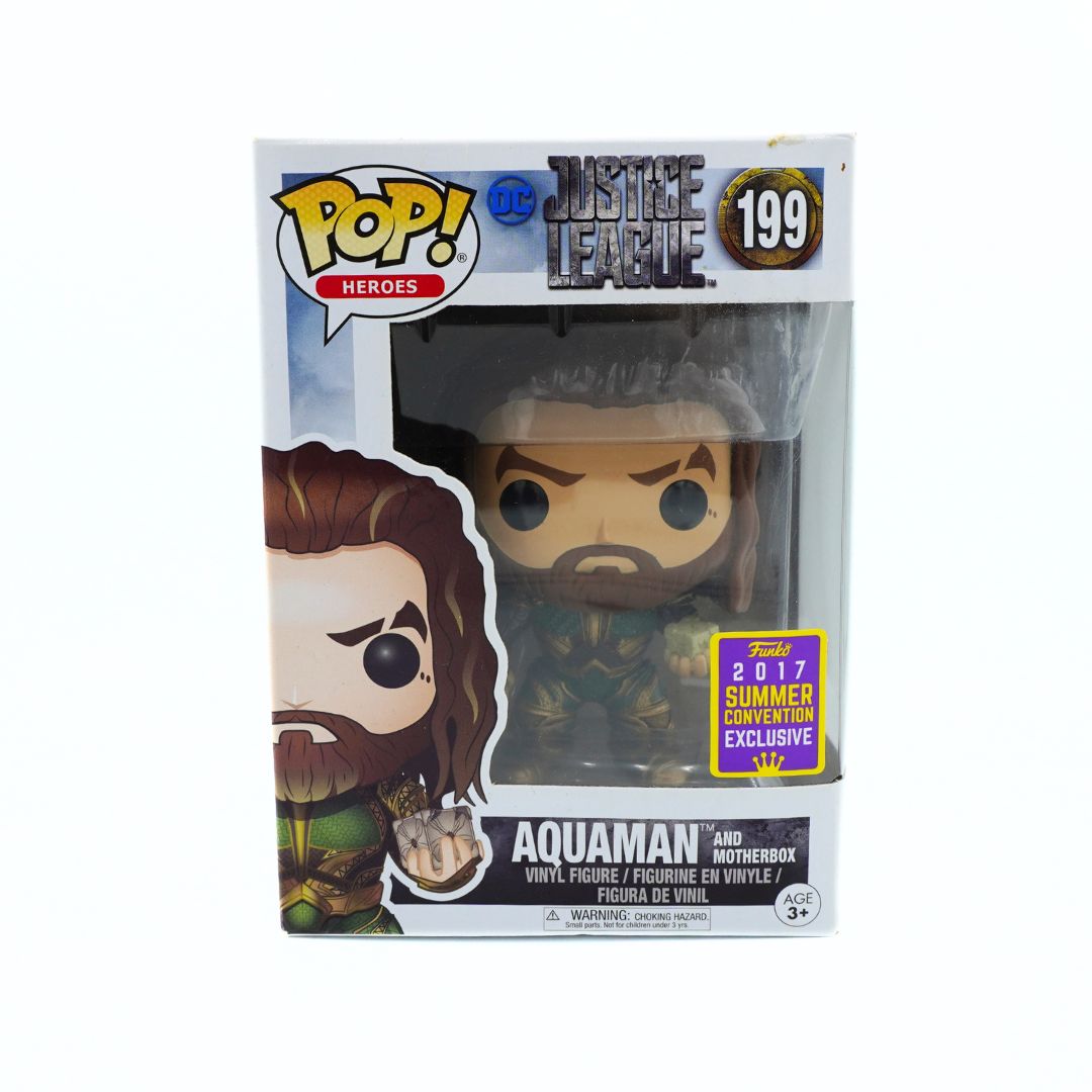 Funko Pop! vinyl figure of Aquaman from Justice League, number 199 in the Pop! Heroes series. The figure is in its original window box packaging, featuring a purple 2017 Summer Convention Exclusive sticker.