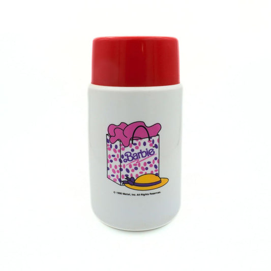 1990 Mattel Barbie thermos with a pink shopping bag, yellow hat and red lid