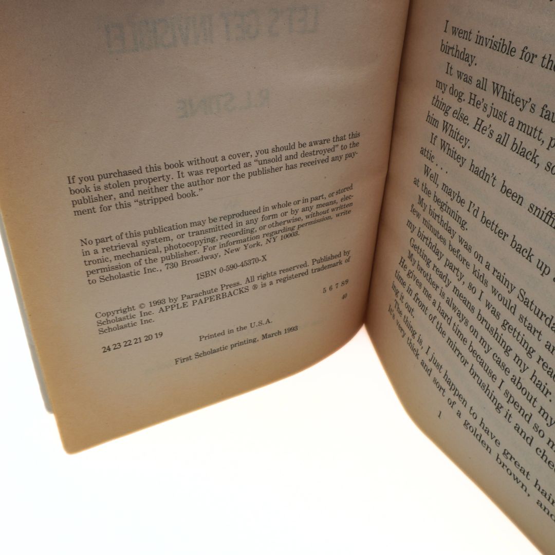 Open book with text and copyright notice on a white background