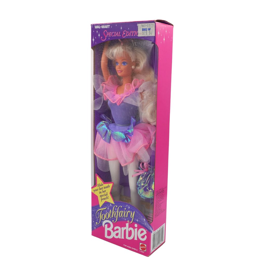 Tooth Fairy Barbie doll in packaging with pink and purple design