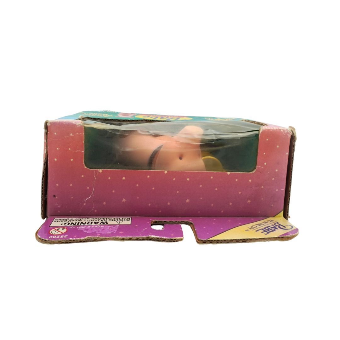 Babe figure in its original box showing some damage