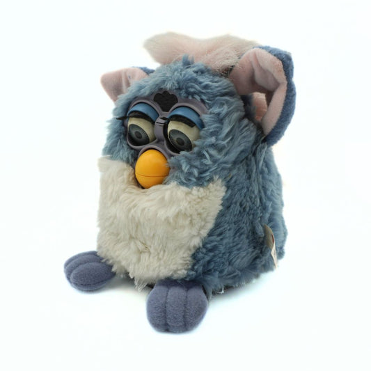 Blue plush toy with a white chest on a white background
