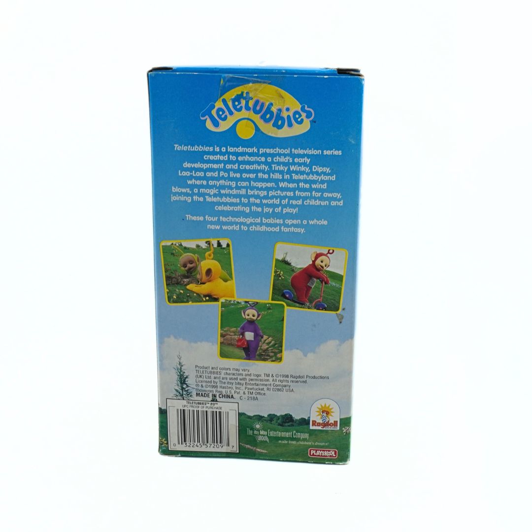 Back of a Teletubbies 1998 figurine box showing the characters in various scenes