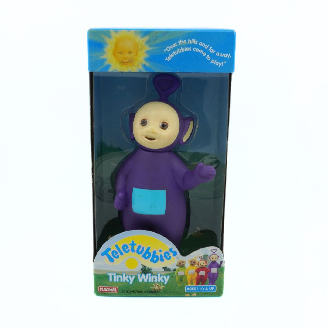 Tinky Winky toy figure in packaging with Teletubbies branding