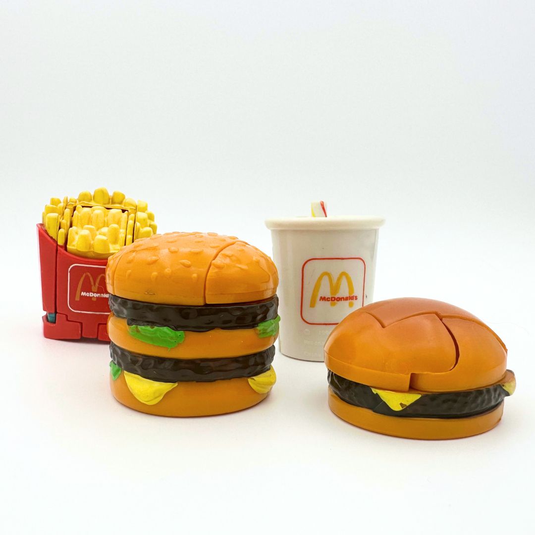 Four McDonalds changeables: Big Mac, hamburger, drink and fries