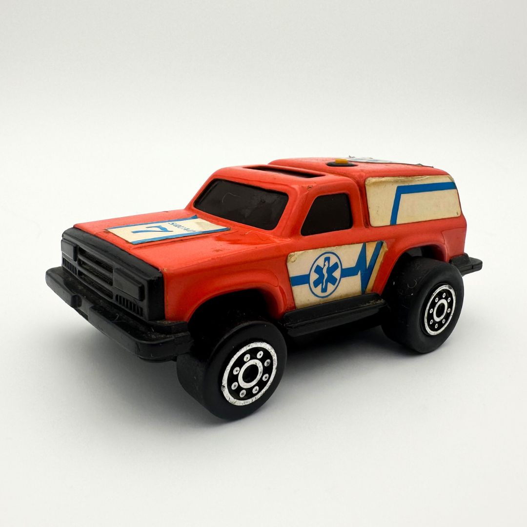 Orange ambulance die cast car