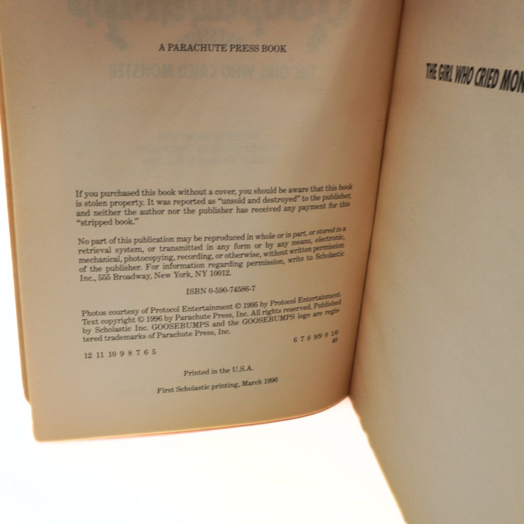 Open book showing a copyright page with text