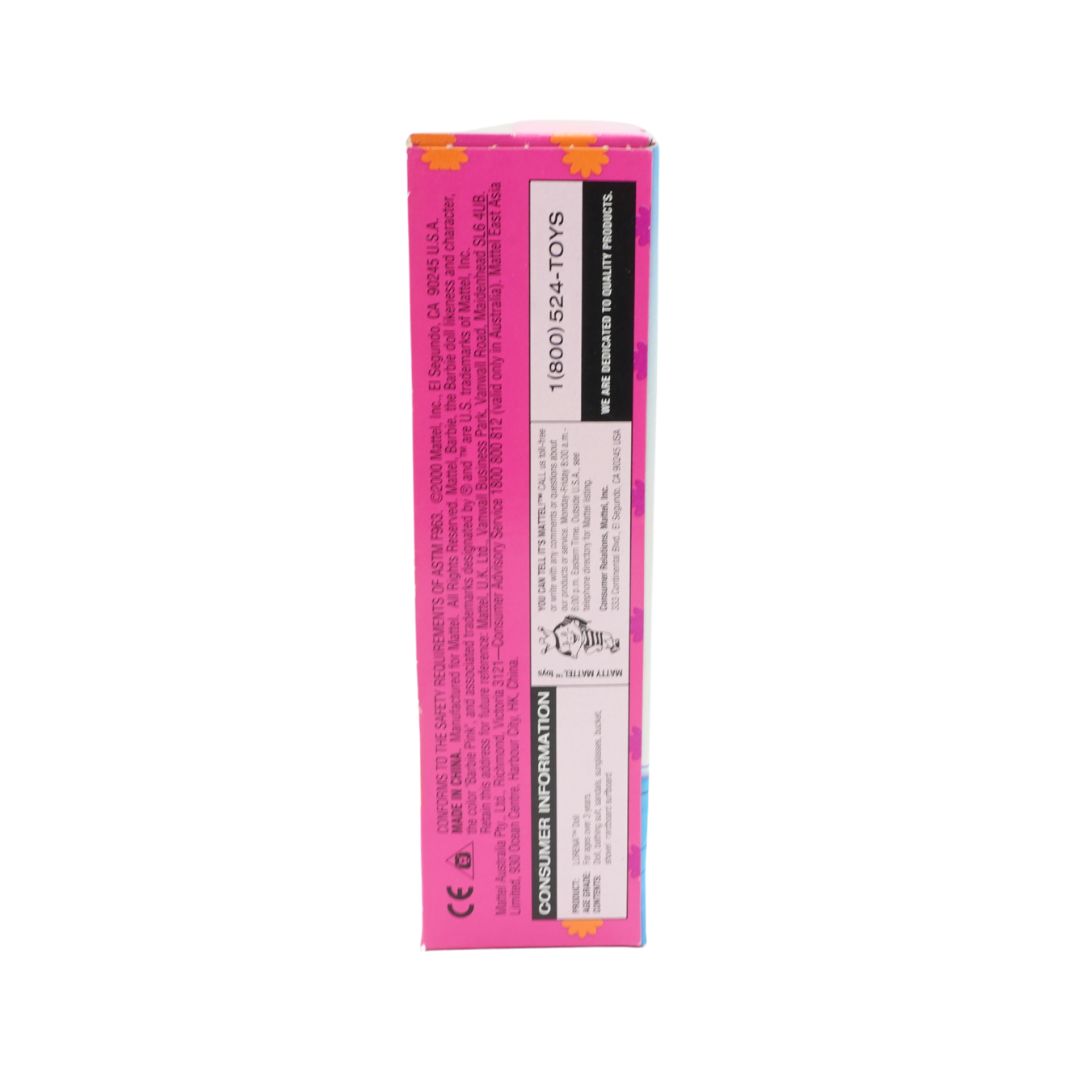 Pink toy packaging with text and barcodes on a white background