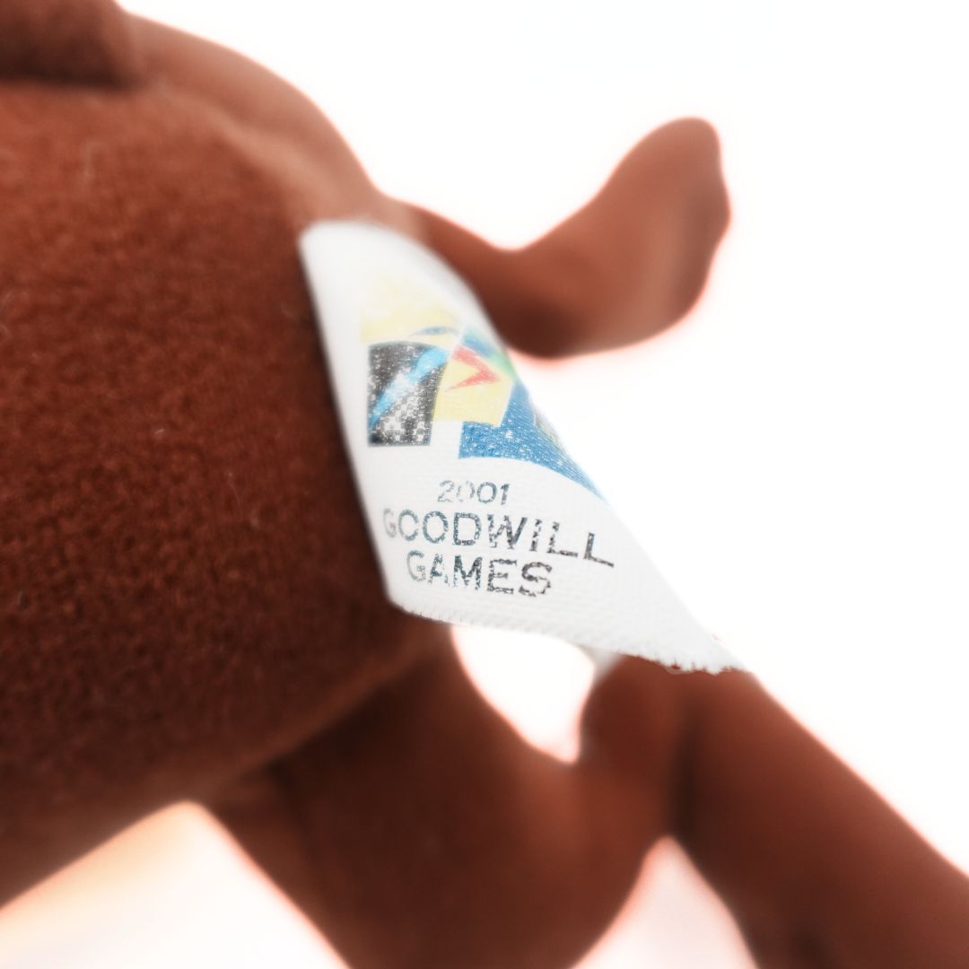 Closeup of the 2001 Goodwill Games tag on the Taz Devil plush released for the Brisbane games