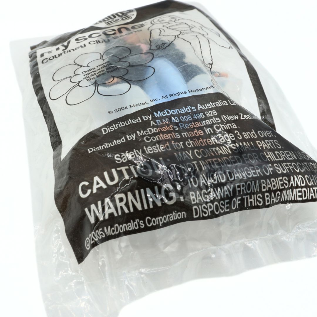 McDonald's Happy Meal toy packaging with warning label
