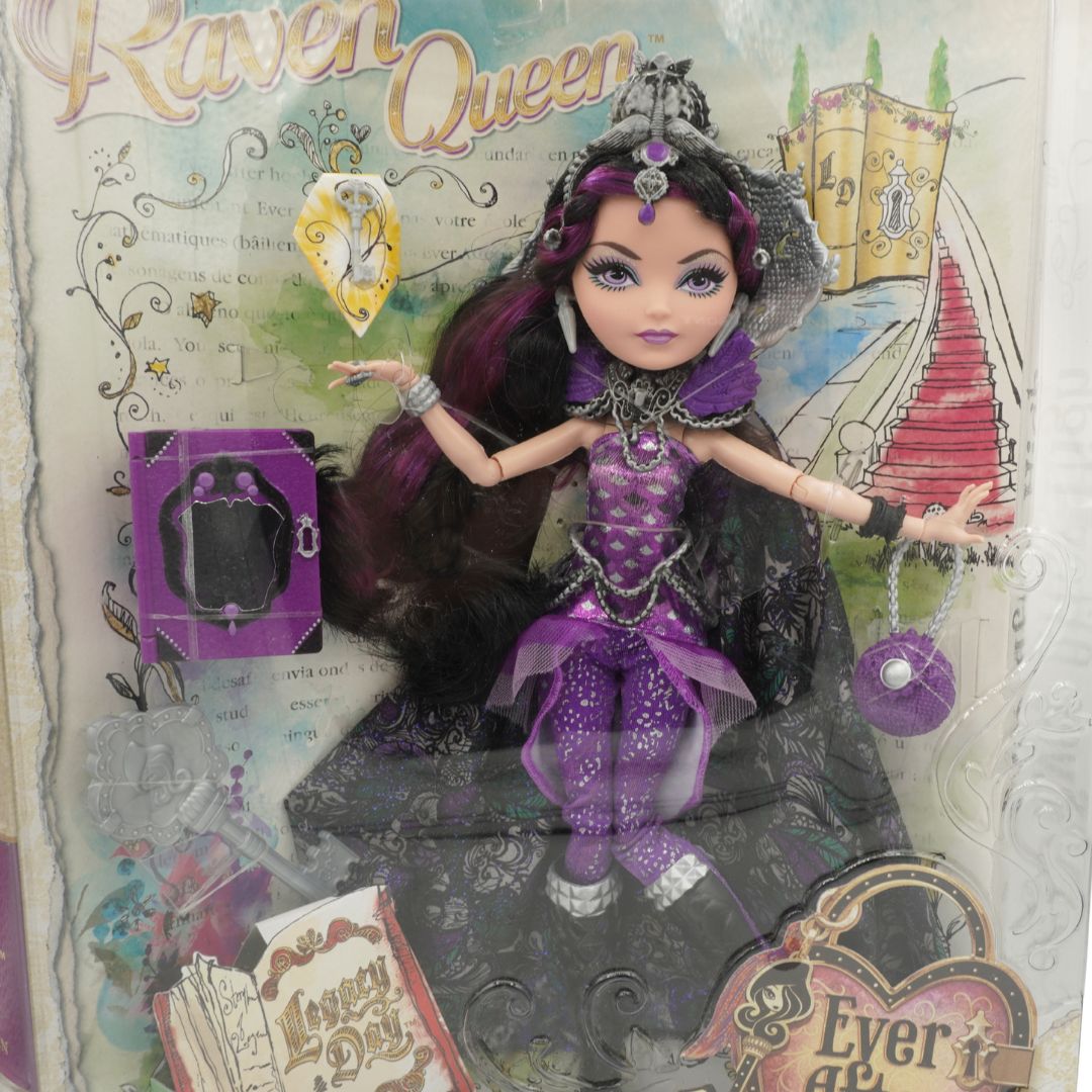Doll in a purple and black outfit with 'Raven Queen' text on packaging