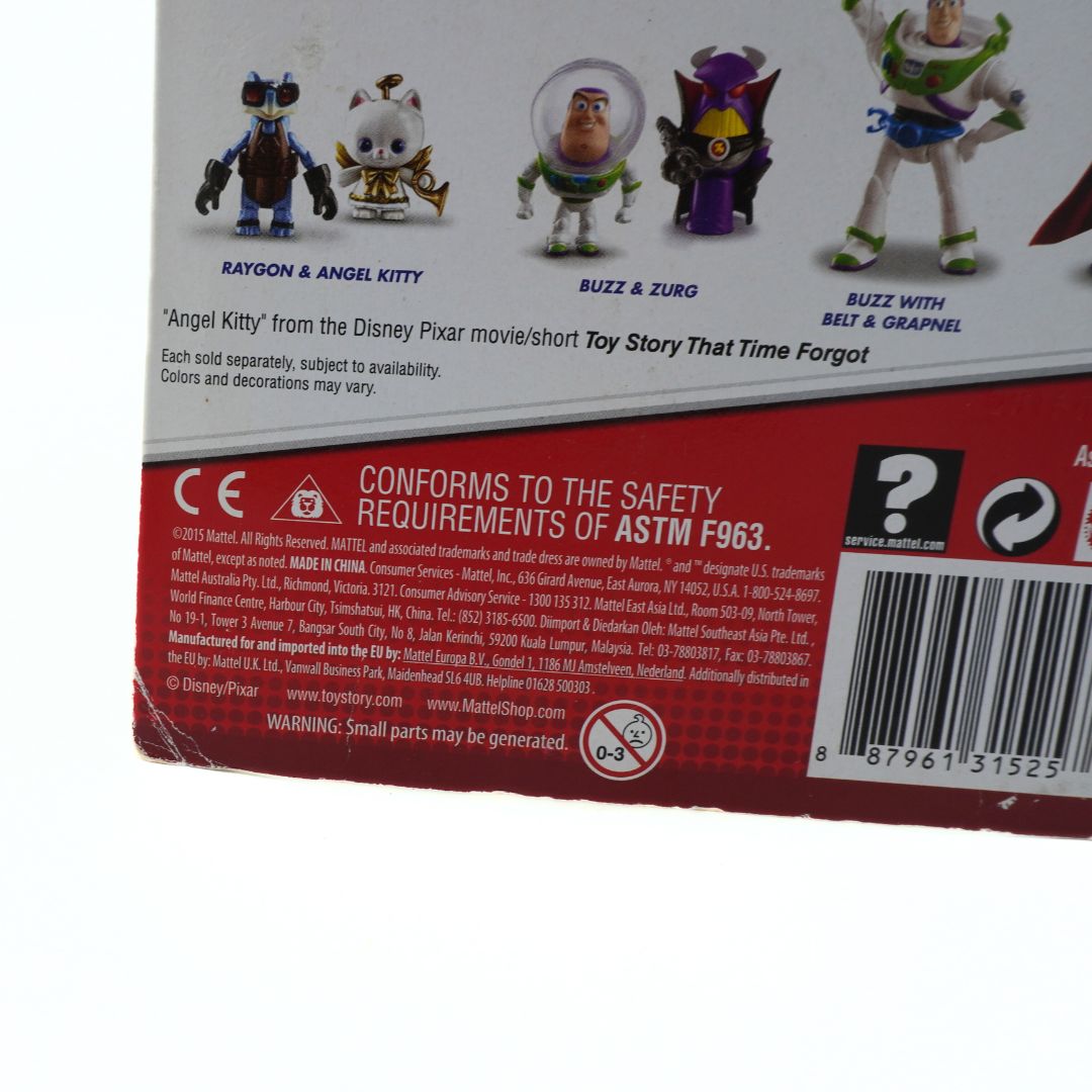 Toy packaging with character illustrations and safety information on a white background