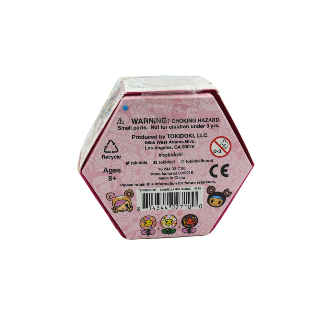 Donut themed hexagonal box for Donutella and her Sweet Friends by Tokidoki, photographed on a white background