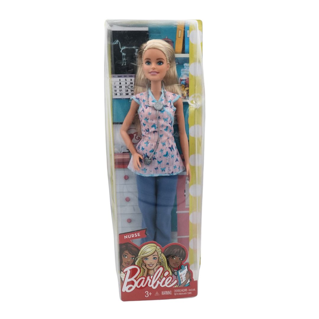 Barbie doll in a nurse outfit, packaged in a box with 'Barbie' and 'Nurse' themes visible.