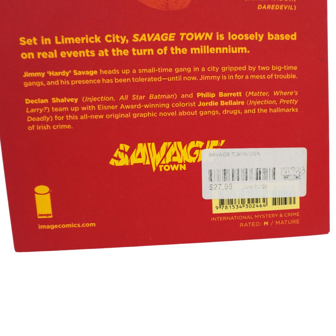 Back cover of the graphic novel 'Savage Town' by Image Comics, featuring a bright red background with yellow text and title logo, plus a white barcode sticker near the bottom.