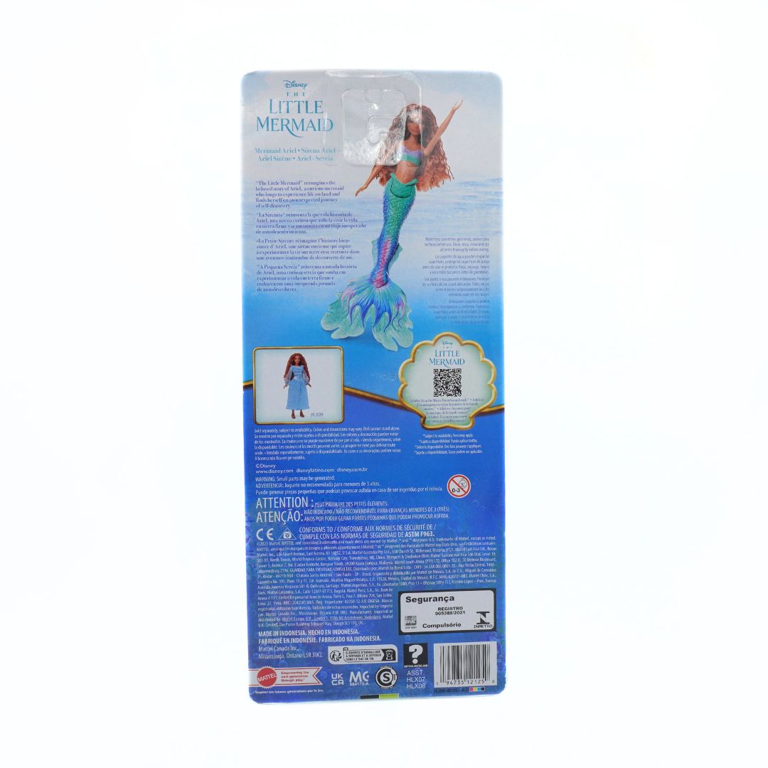 Mermaid toy figure in packaging with branding and product details on a white background