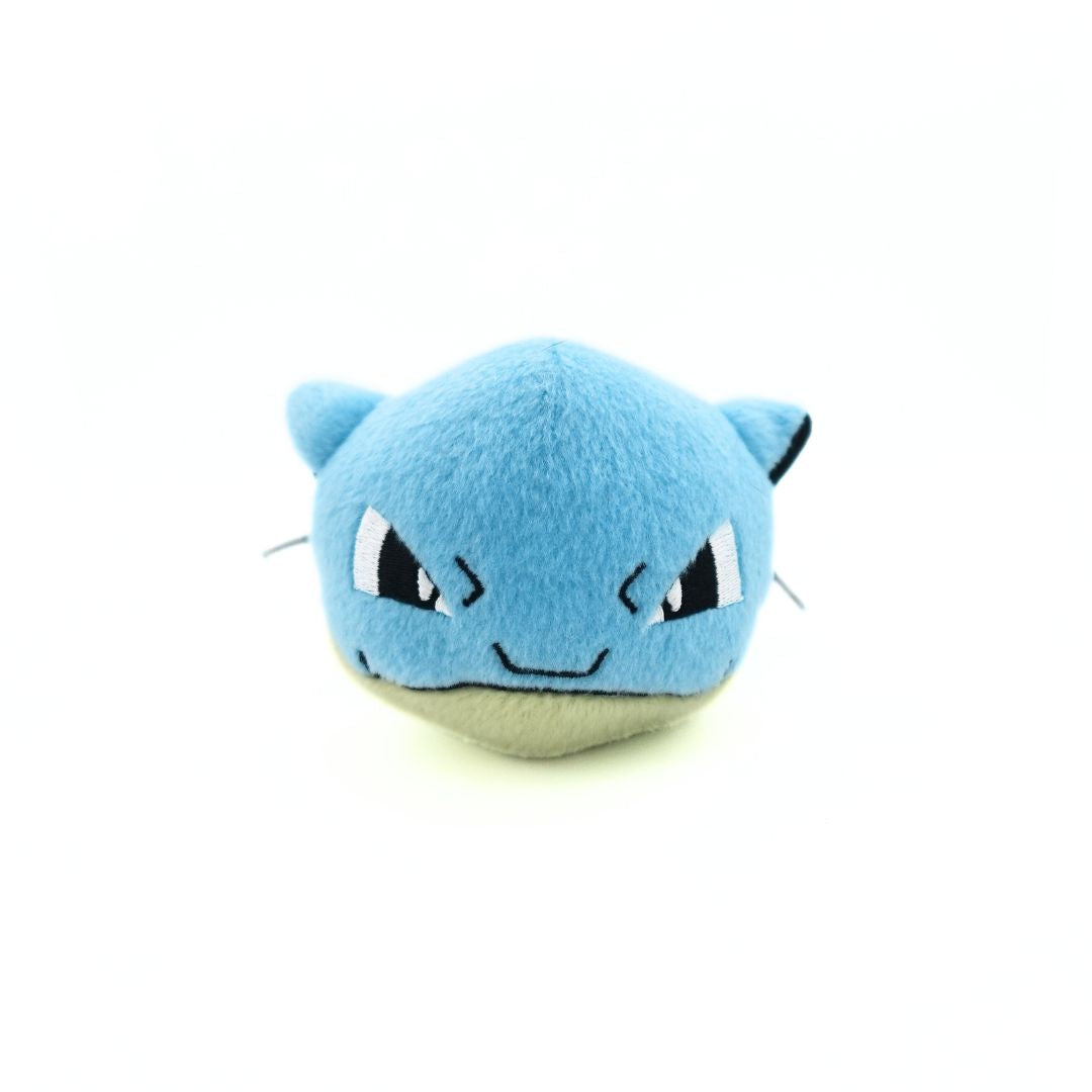 Front on photo of a Blastoise plush toy